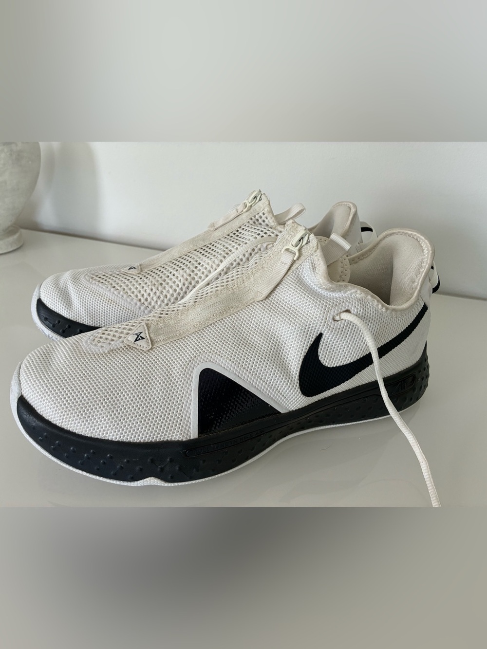 Nike Men’s White and Black Slip-On Athletic Trainers